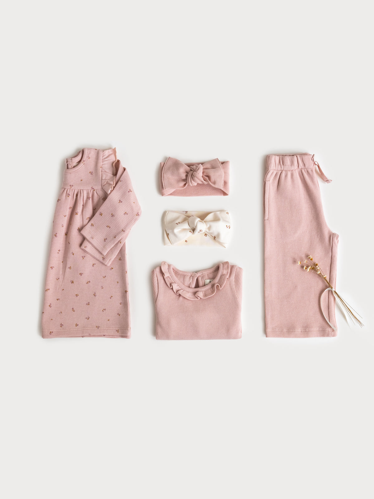 Mae Waffle Knit Ruffle Bodysuit - Petal Pink Baby : One Pieces : Bodysuits : Long Sleeves KENDI by Colored Organics Mae Waffle Knit Ruffle Bodysuit | Colored Organics®