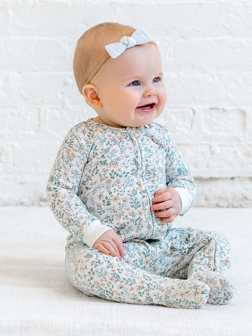 Neve Ruffle Zipper Footed Romper - Merion Floral / Laguna + Shell Sale : Baby : One Pieces : Bodysuits : Long Sleeves KENDI by Colored Organics Neve Ruffle Zipper Footed Romper | Colored Organics®