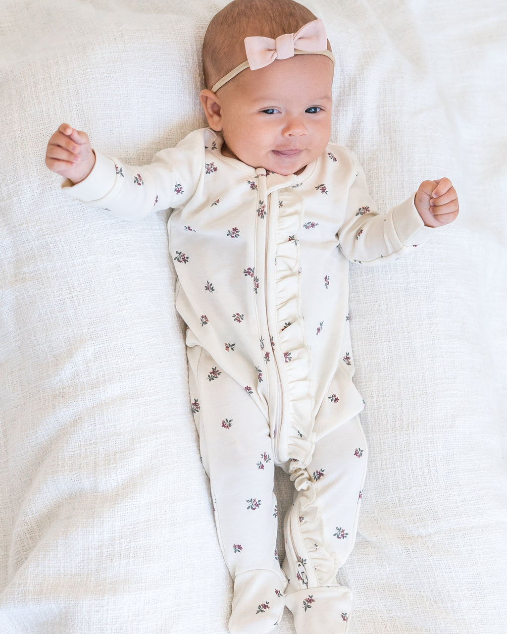 Neve Ruffle Zipper Footie Sale : Baby : One Pieces : Sleepers : Long Sleeves KENDI by Colored Organics Neve Ruffle Zipper Footie Baby | Colored Organics®