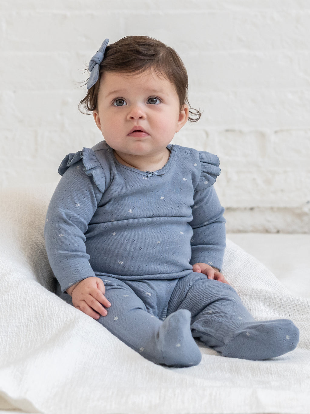Lucille Pointelle Ruffle Footed Romper - Macy Bluen Baby : One Pieces : Rompers : Long Sleeves KENDI by Colored Organics Lucille Pointelle Ruffle Footed Romper | Colored Organics®
