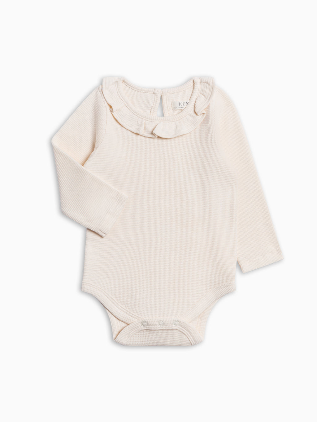 Mae Waffle Knit Ruffle Bodysuit - Ivory Baby : One Pieces : Bodysuits : Long Sleeves KENDI by Colored Organics Mae Waffle Knit Ruffle Bodysuit | Colored Organics®