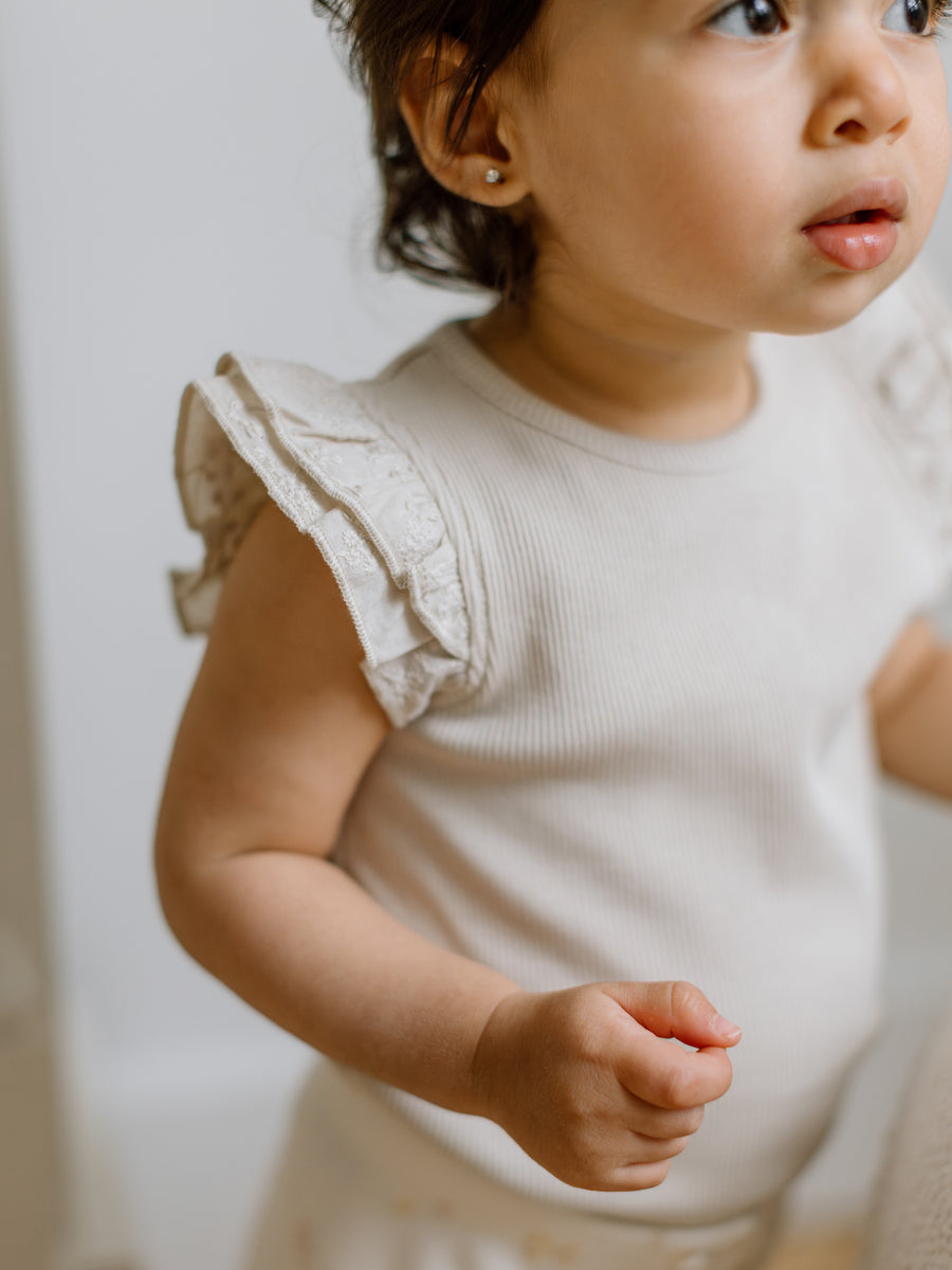 Daphne Ribbed Tank with Eyelet Ruffle Sale : Baby-Kids : Tops : Shirts : Short Sleeves Kendi Daphne Ribbed Tank with Eyelet Ruffle | Colored Organics®