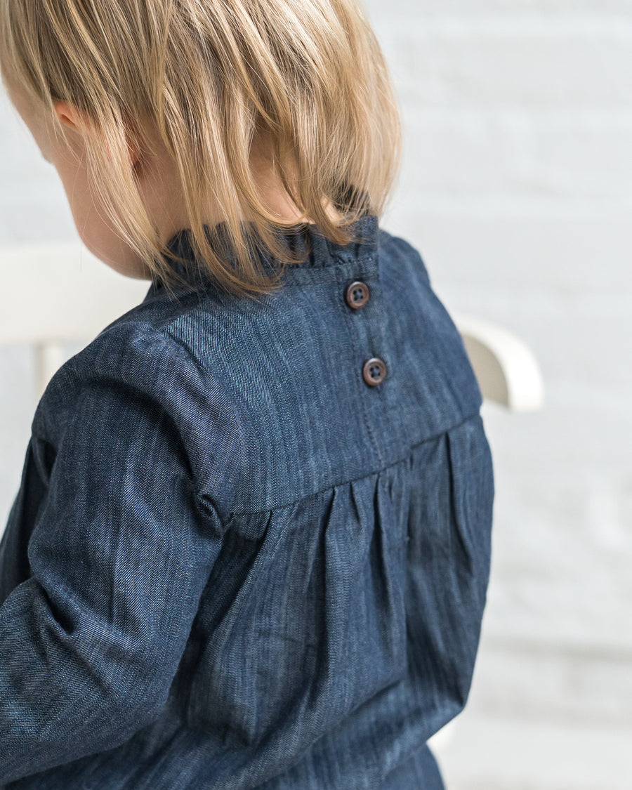 Chantal Chambray Ruffle Romper Sale : Baby : One Pieces : Bodysuits : Long Sleeves Kendi Organic Cotton Chantal Chambray Ruffle | Colored Organics®