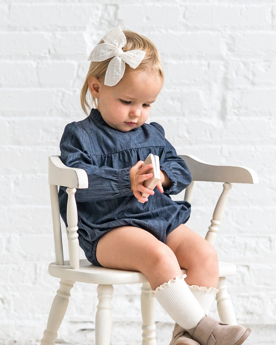 Chantal Chambray Ruffle Romper Sale : Baby : One Pieces : Bodysuits : Long Sleeves Kendi Organic Cotton Chantal Chambray Ruffle | Colored Organics®